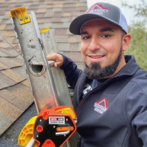 A man with a beard and a baseball cap is next to a ladder with a Lock Jaw Ladder Grip. Text overlay says "FAREN".